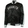 Shop Brooklyn Nets The Offensive Varsity Full-Snap Satin Black Jacket