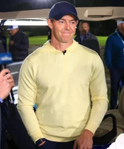 Shop Rory McIlroy Golf Hoodie in Yellow