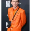 LA Premiere of A24’s Timothée Chalamet Marty Supreme Leather Orange Suit