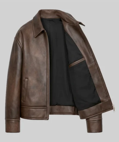 Stylish brown leather bomber jacket featuring a distressed finish for a retro vibe