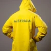 Reilly Flanagan Australia Milano Cortina 2026 Half-Zip Adjustable Hood Teal Accents Olympic Logos Yellow Technical Ski Jacket