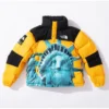 Supreme x The North Face Statue of Liberty Baltoro Yellow Puffer Jacket