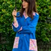 Anne Hathaway TV Movie The End of Oak Street 2026 Denise Blue Floral Coat